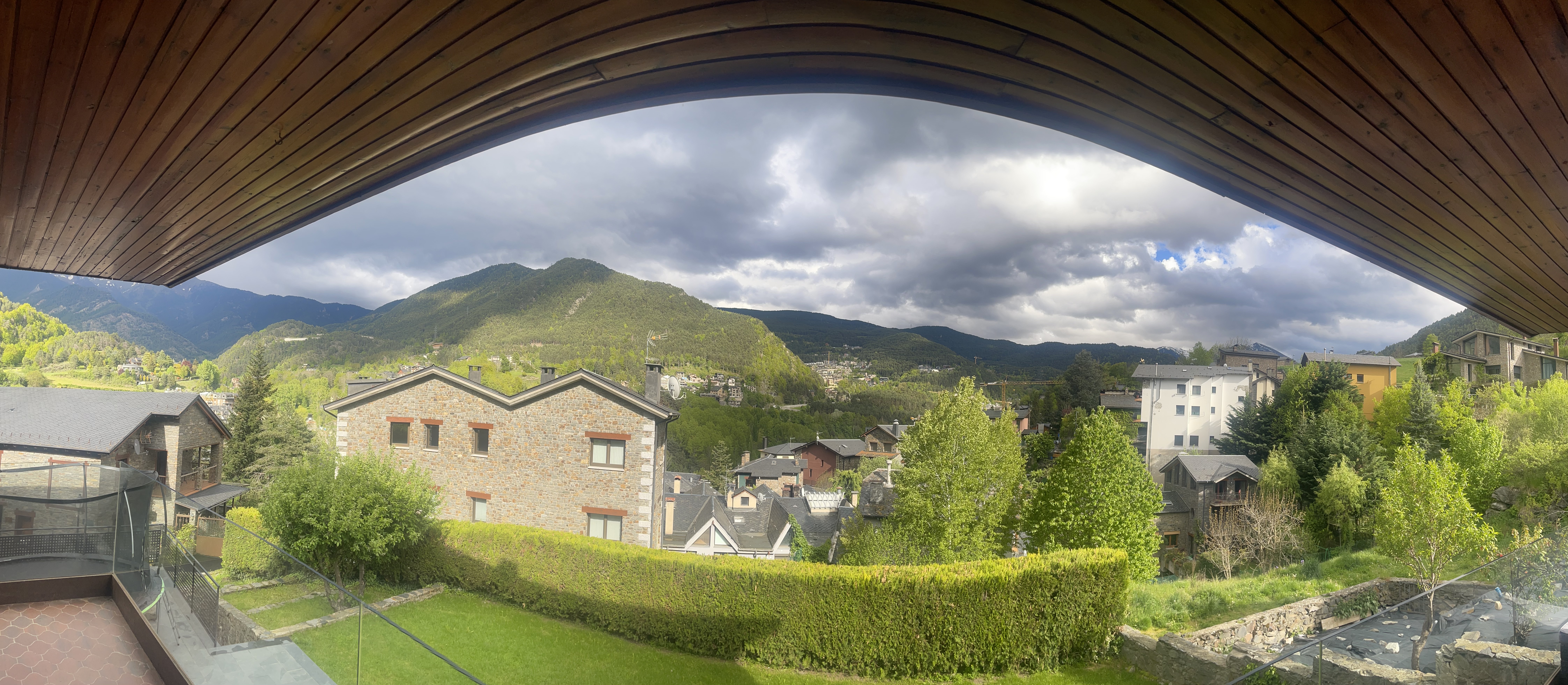 Panoramic mountain view from the chalet balcony on a cloudy day, La Massana, Andorra